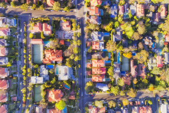 A bird's eye view photograph taken with a drone looking down at a residential suburb in an unknown region of Australia