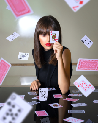 Woman with deck of cards