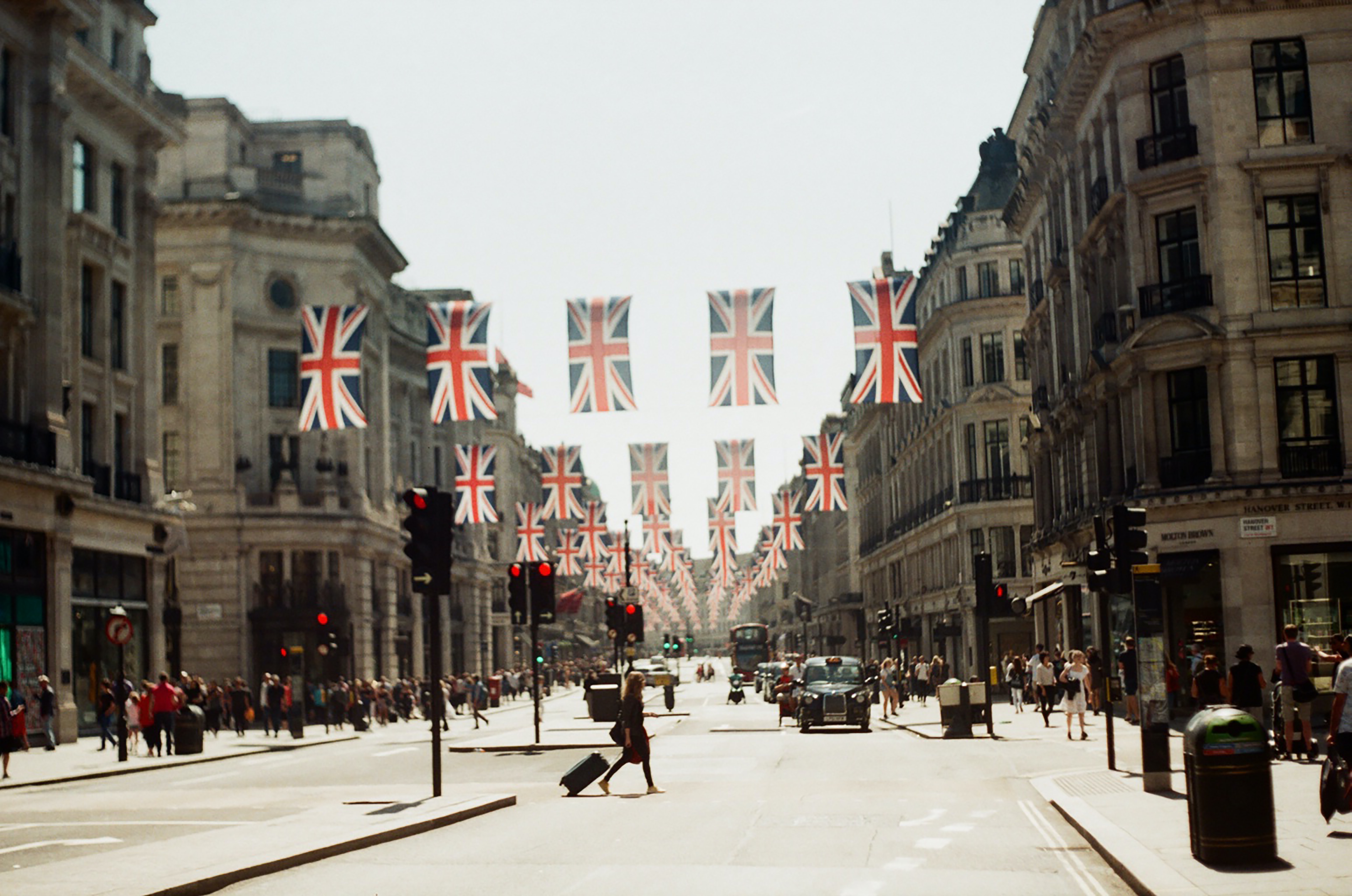 British flags above a busy street