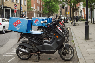Dominos Pizza delivery bikes lined up