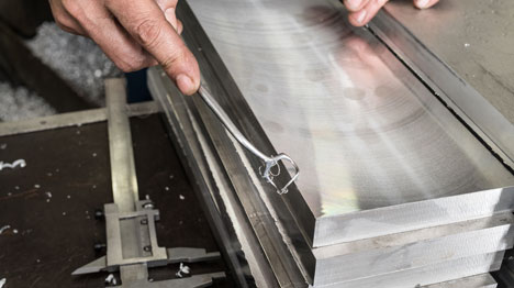 Hand Deburring vs. Machine Deburring: The Cost Factor