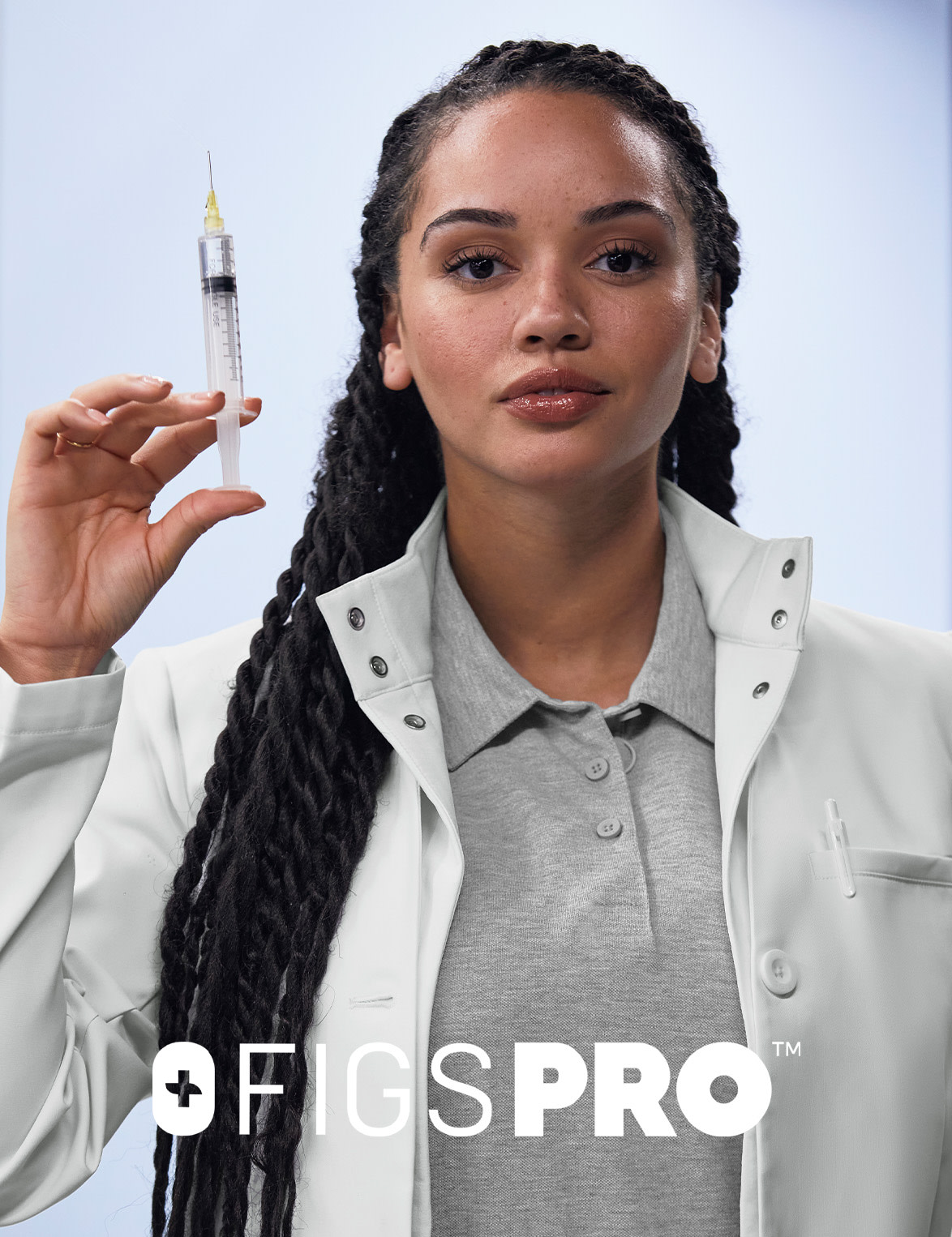 FIGSPRO™ Pique Shortsleeve Scrubpolo — Made with 100% Pima Cotton to stay comfy during telemedicine appointments.