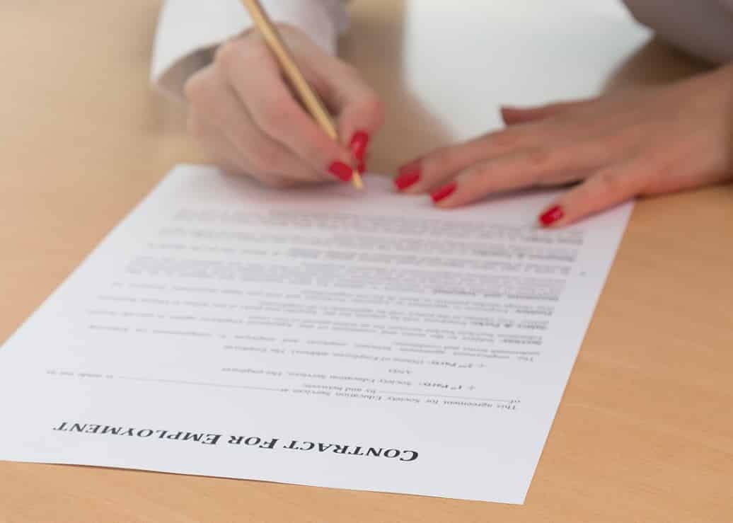 What is required in a small business employment contract?