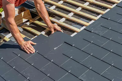 Fixing slate roof tiles