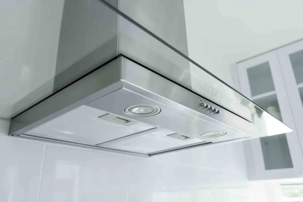 Which trade will install a new cooker hood?