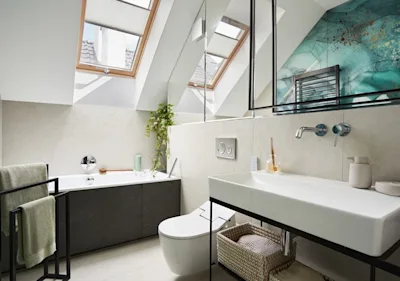Small ensuite loft bathroom with natural light