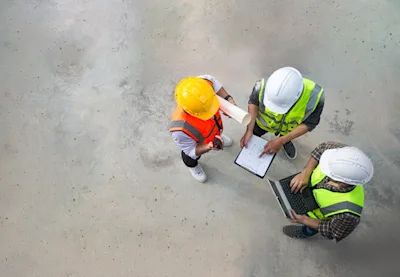 Surveyors discussing project
