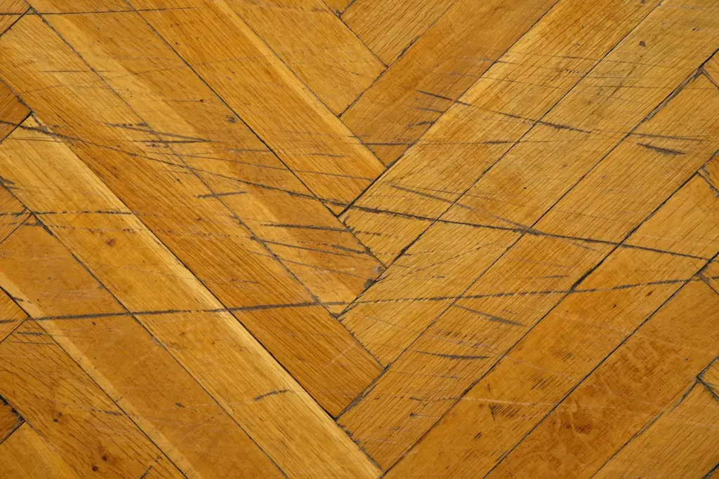 Can a scratched wood floor be easily fixed?