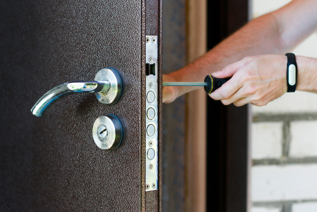 Hanging a new door DIY vs professional installation
