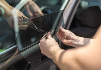 How to get car window tint off