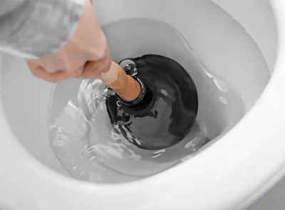 Fixing a toilet that fills up with water when it’s flushed