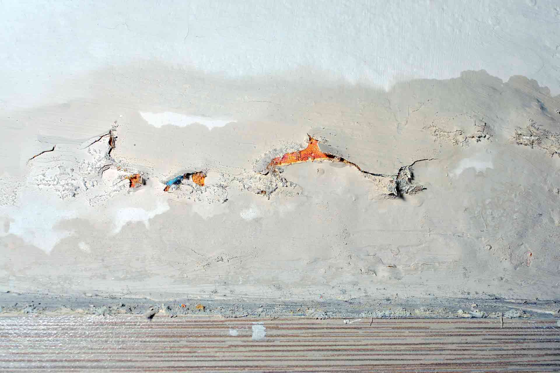 What is the cause of rising damp in homes?