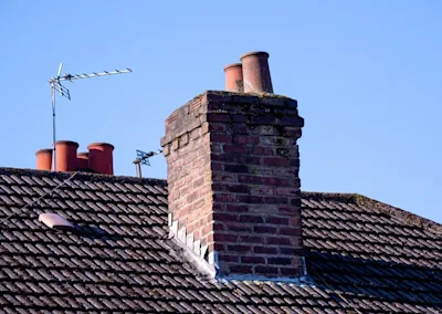 Chimney on tiled roof
