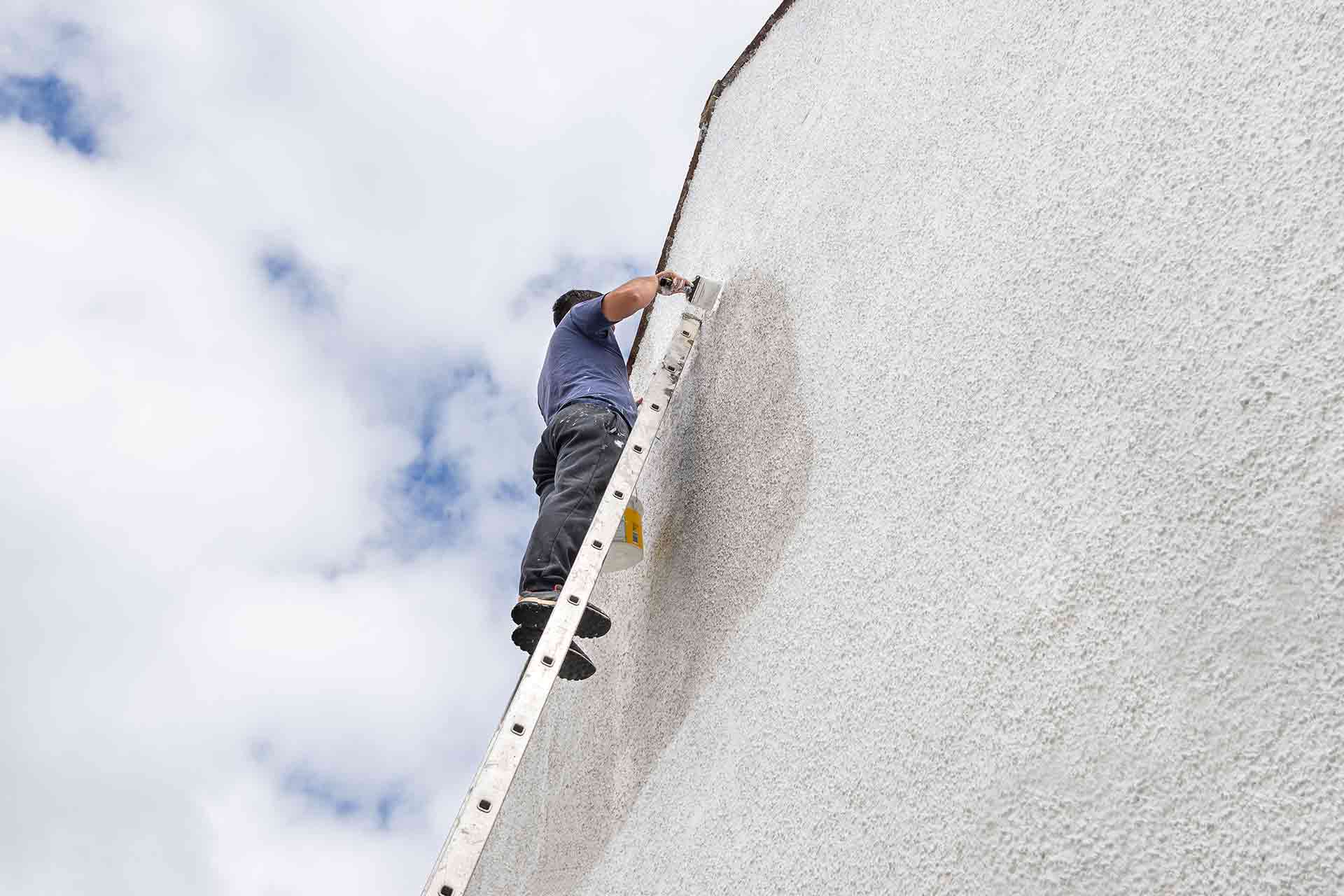 Cost to paint pebbledash house