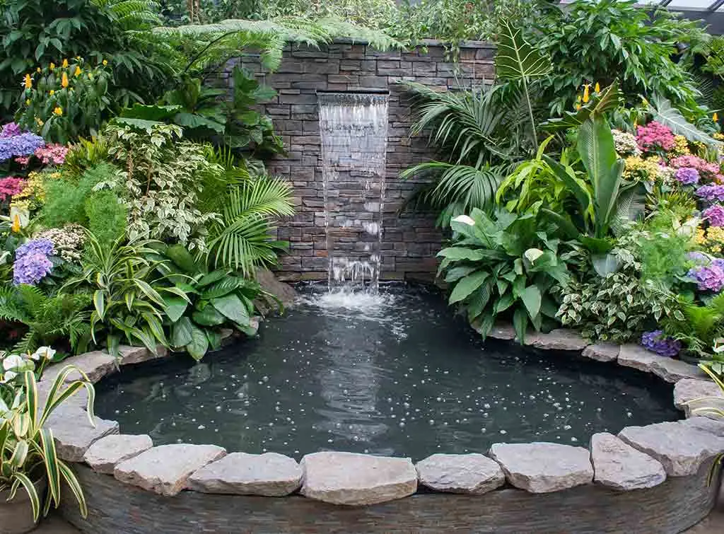 Raised pond waterfall ideas: A rippling retreat