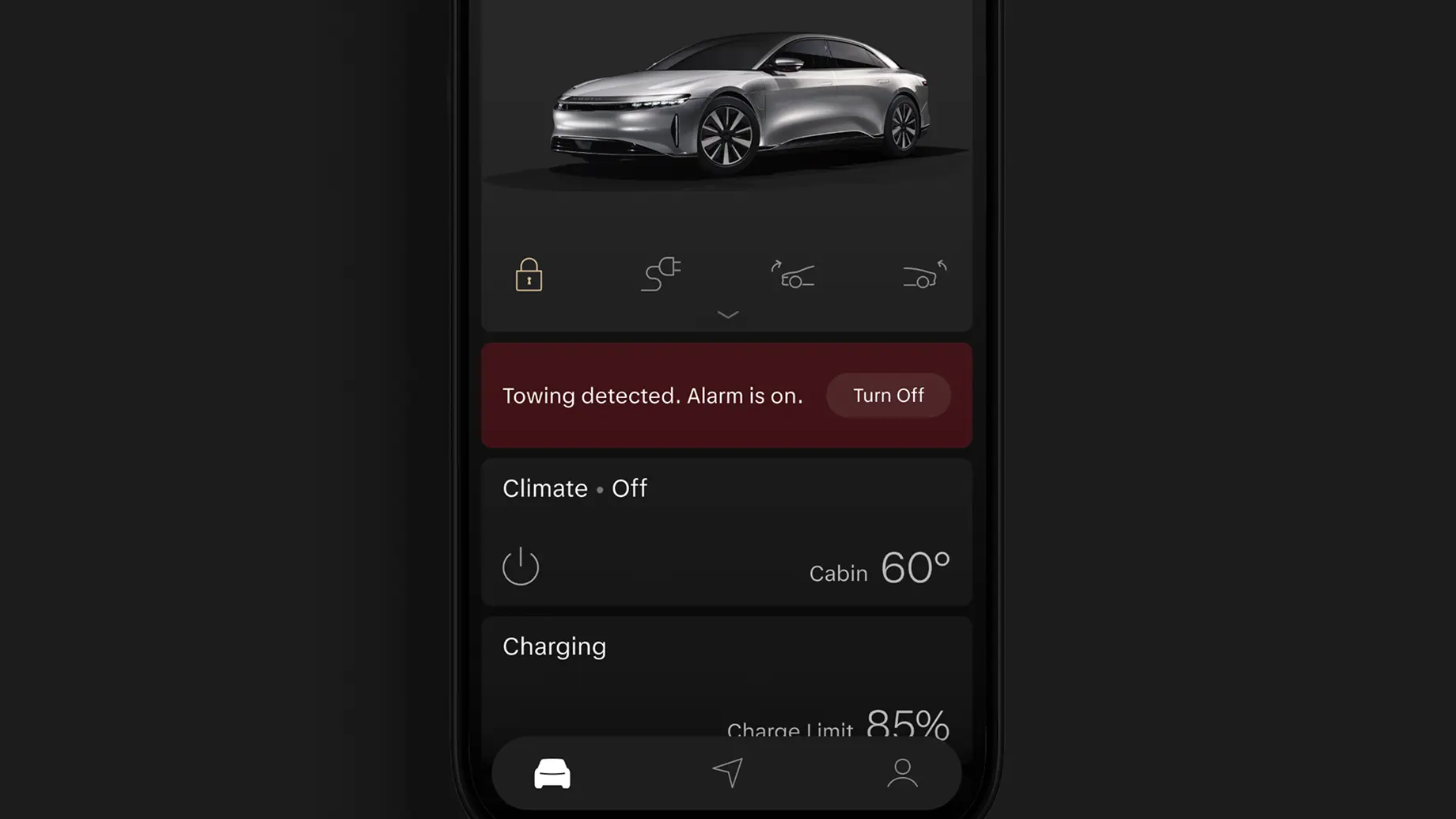 Mobile app screen showing a silver electric car, a towing detection alarm alert, and climate controls set to off at 60°F.