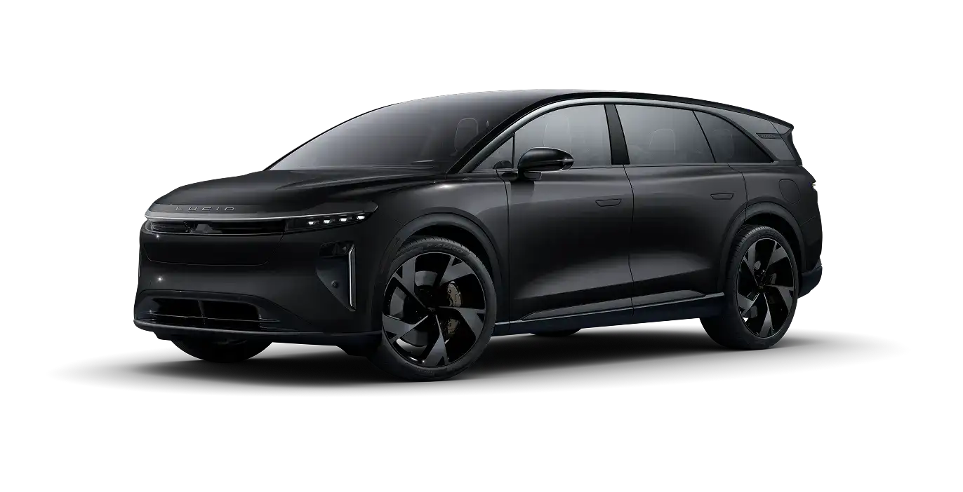 Sleek black electric SUV with aerodynamic design, modern LED headlights, and distinctive wheel rims on neutral background.
