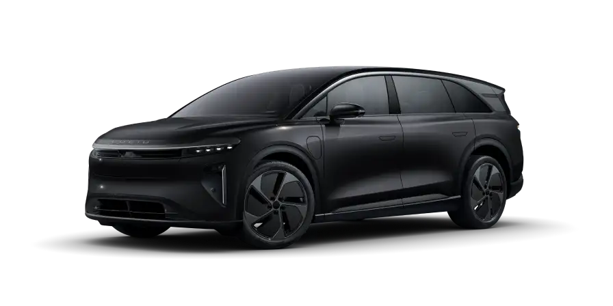 Sleek black electric SUV with aerodynamic design, modern LED headlights, and distinctive wheel rims on neutral background.