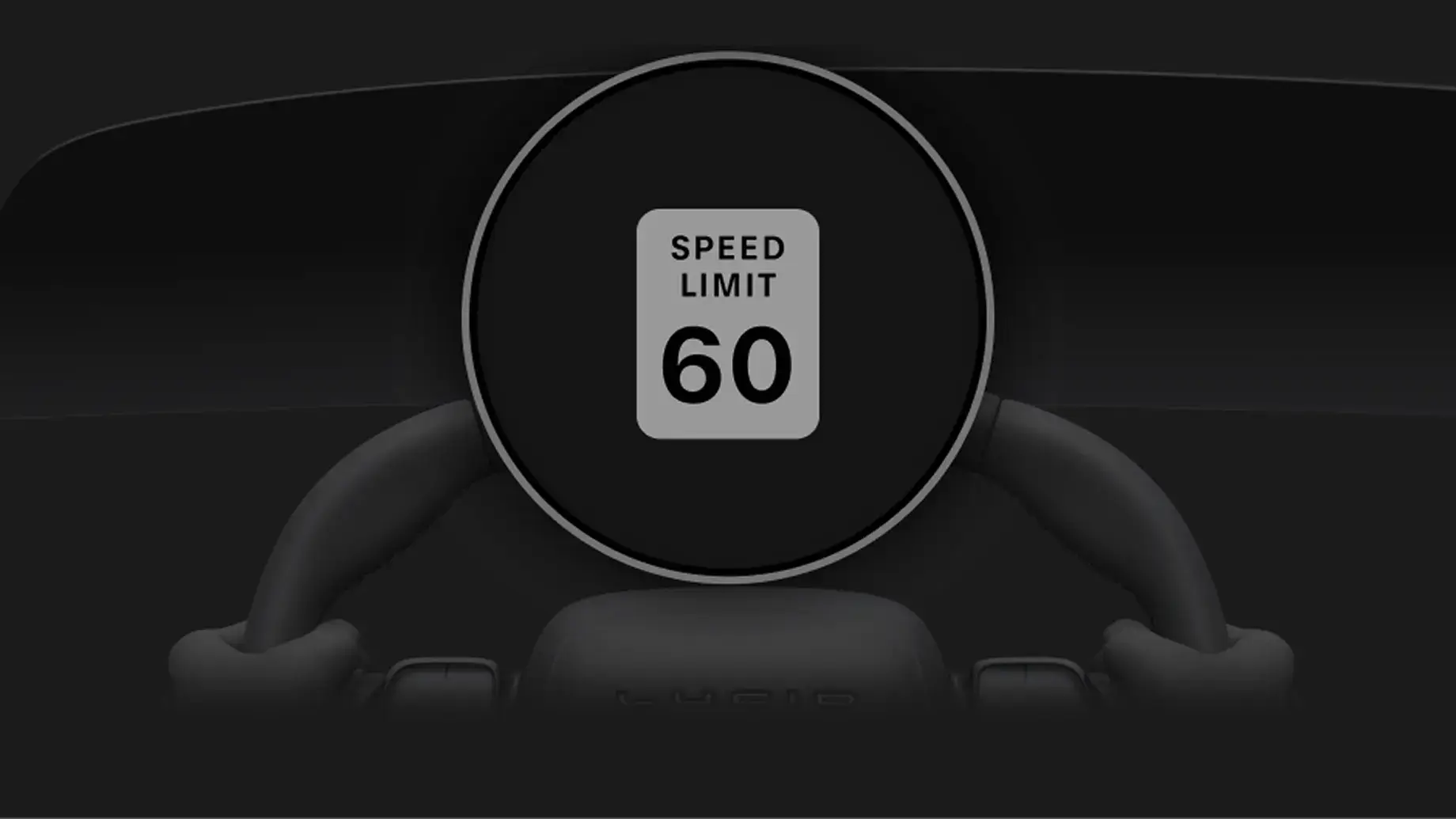 Car dashboard display showing a speed limit 60 sign on a dark circular instrument cluster behind a steering wheel.
