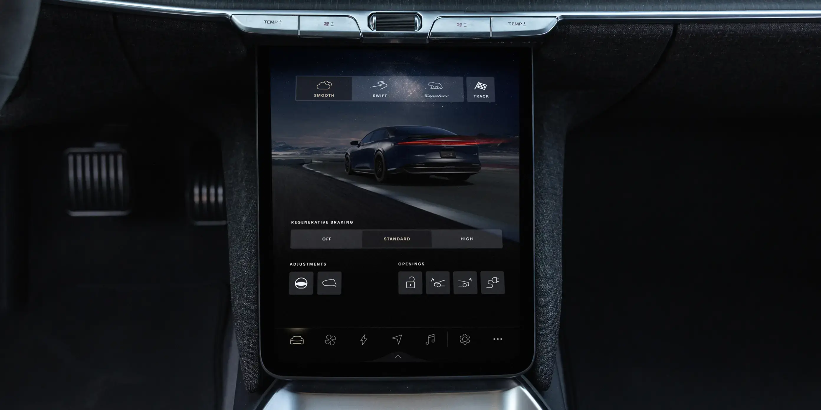 Large vertical touchscreen in a car's center console displaying drive mode and regenerative braking settings.