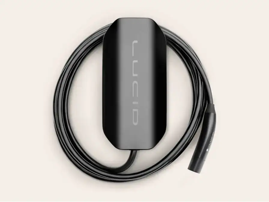 Black Lucid-branded EV home charging unit with coiled cable and connector, displayed on a light background.