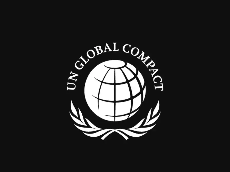 White UN Global Compact logo on black background, featuring a globe with grid lines and olive branches beneath it.
