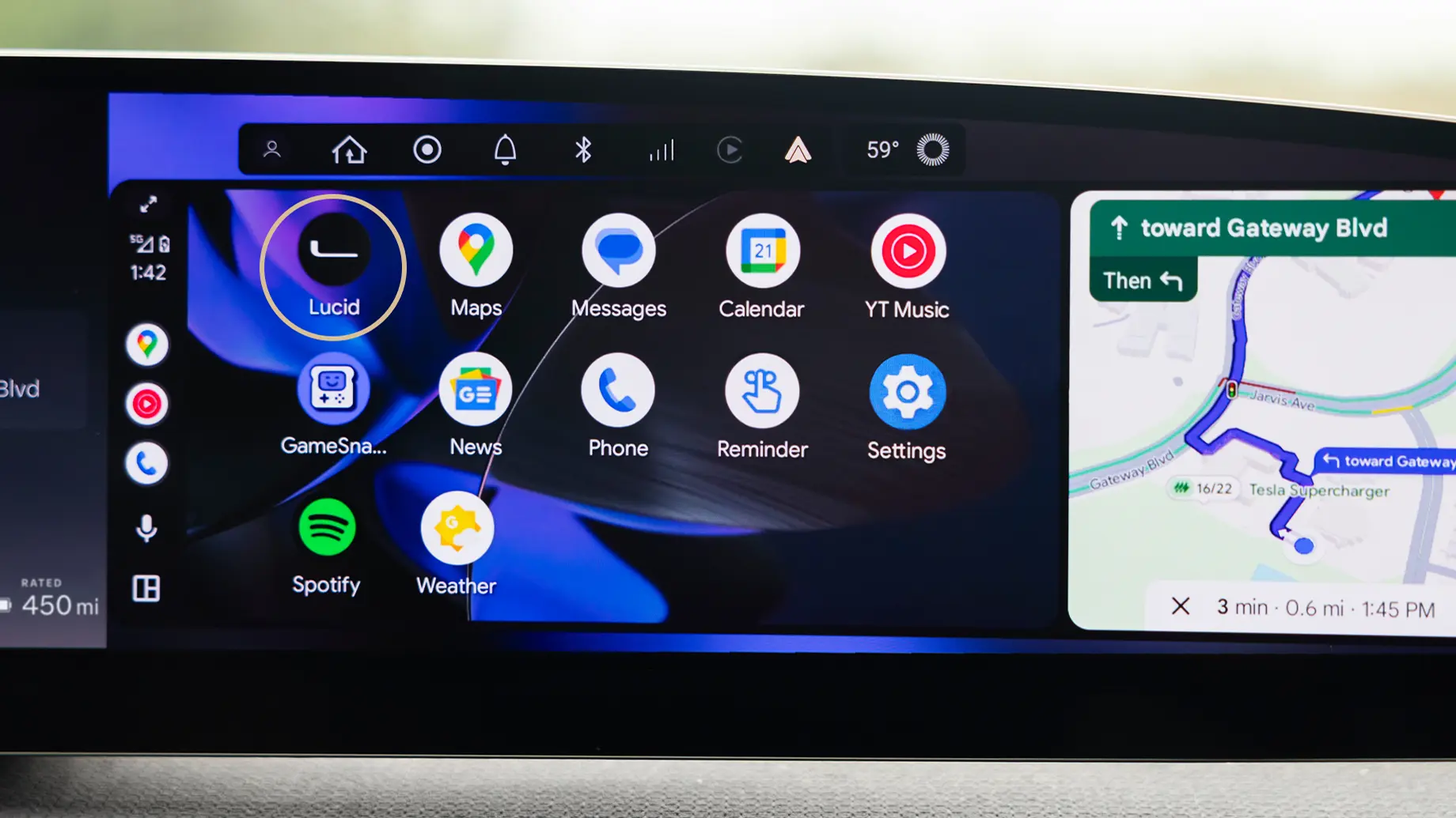 Car dashboard display showing app icons and navigation map with directions to Gateway Blvd, showing 3 minutes remaining.