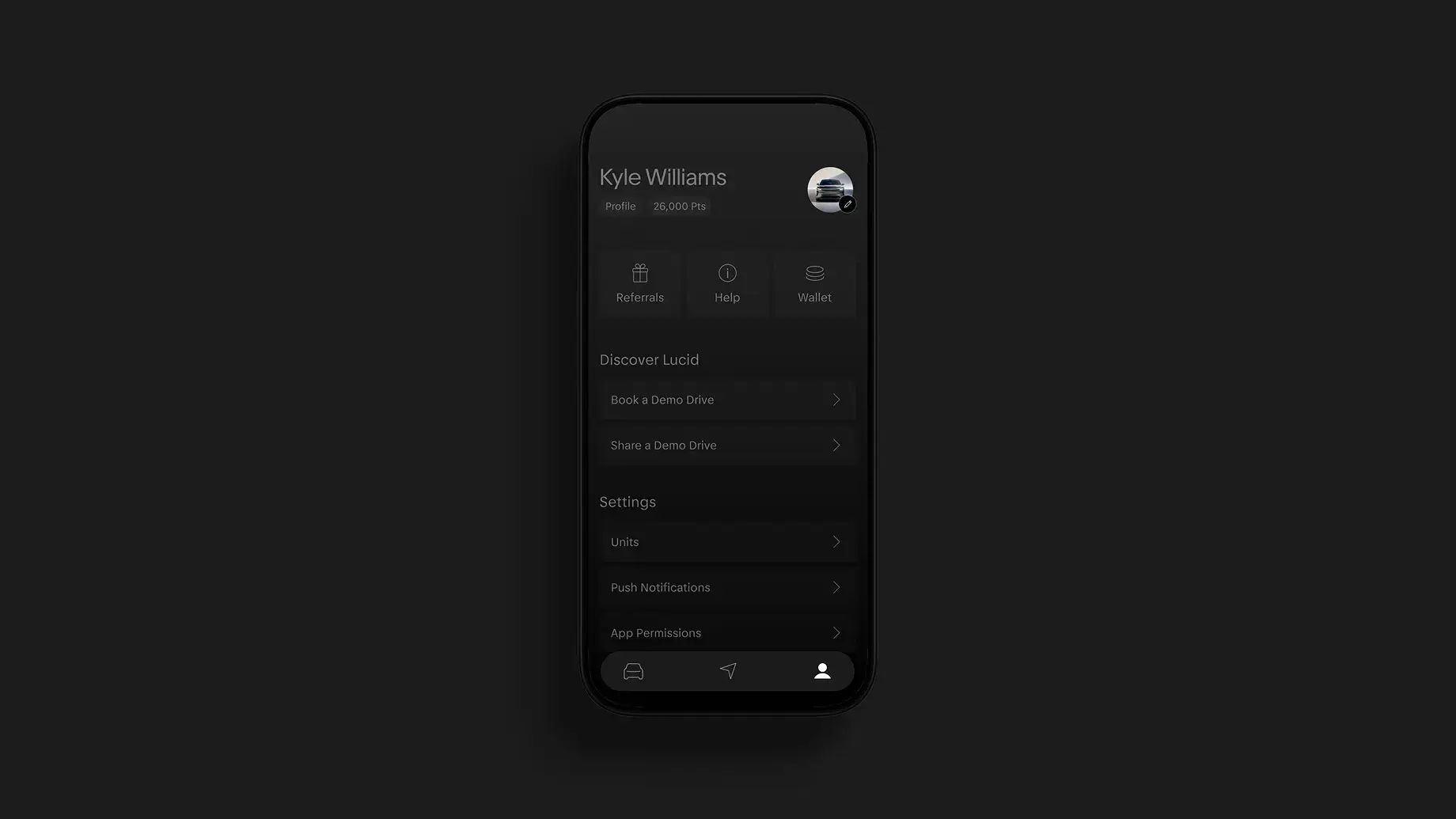 Dark-themed mobile app profile screen for Kyle Williams showing 26,000 points, Referrals, Help, Wallet, and Settings options.