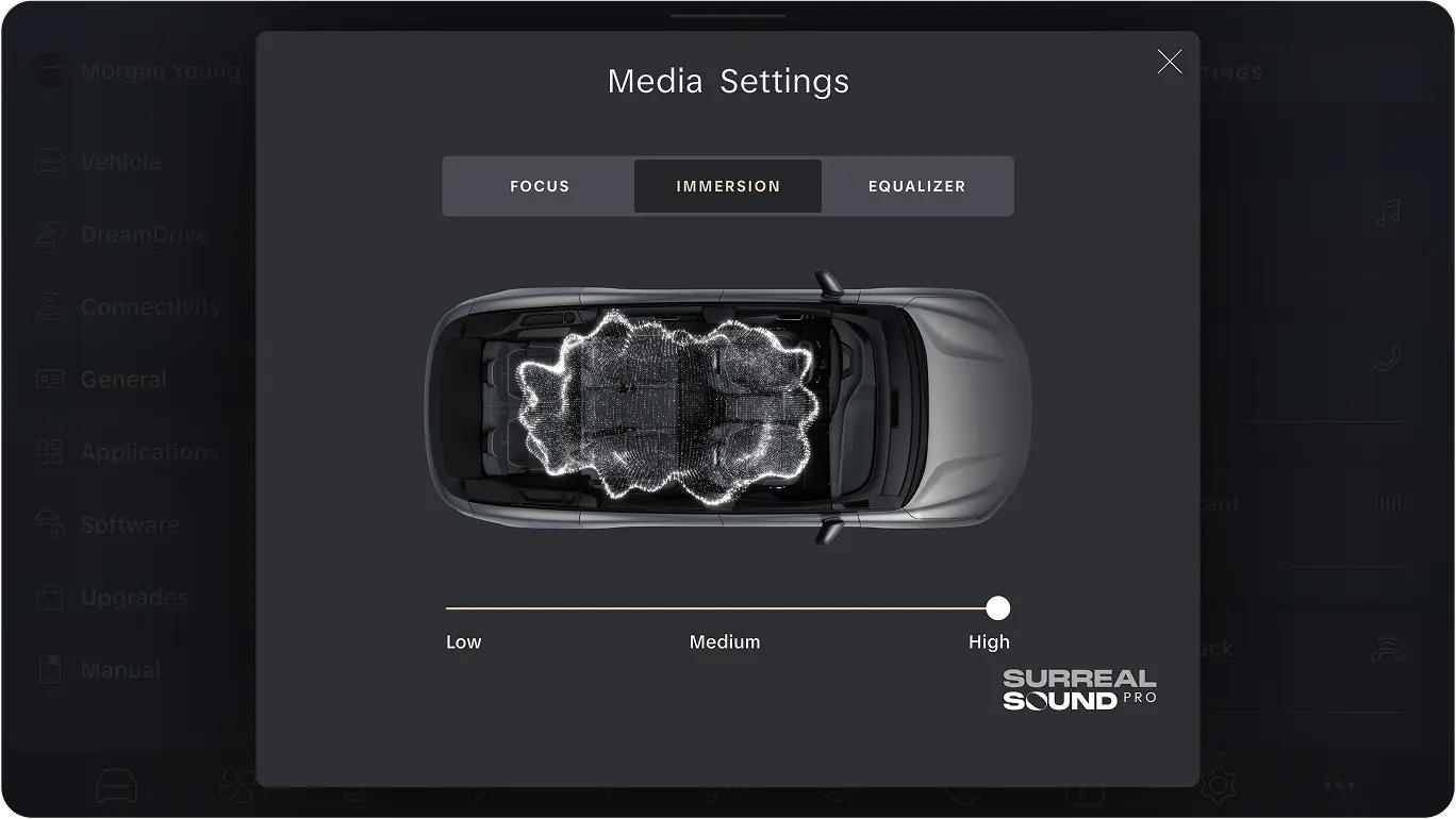 Vehicle media settings interface showing immersion mode with a top-down view of a car and glowing sound visualization.