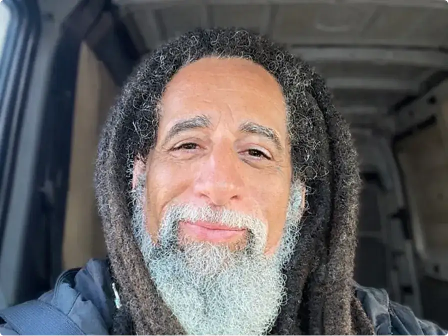 A portrait of Miles Landry, Senior Design Operations