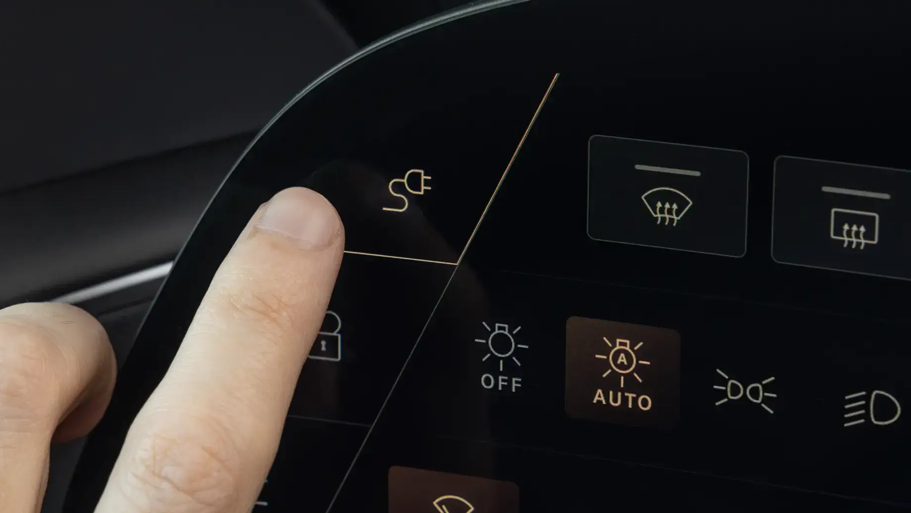 Tap the charge port icon on the Left Cockpit Panel