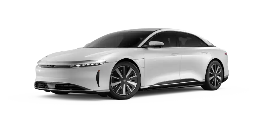 White Lucid Air electric luxury sedan with a dark roof, sleek profile, and stylish multi-spoke wheels on a white background.