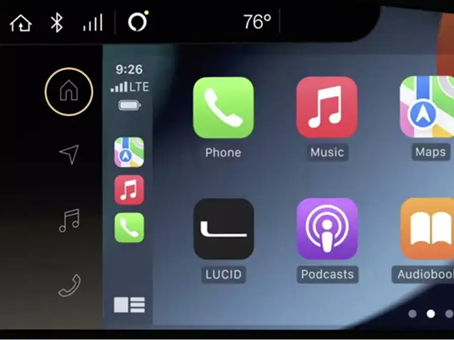 Car dashboard display showing Apple CarPlay interface with Phone, Music, Maps, and Podcasts apps at 76 degrees.
