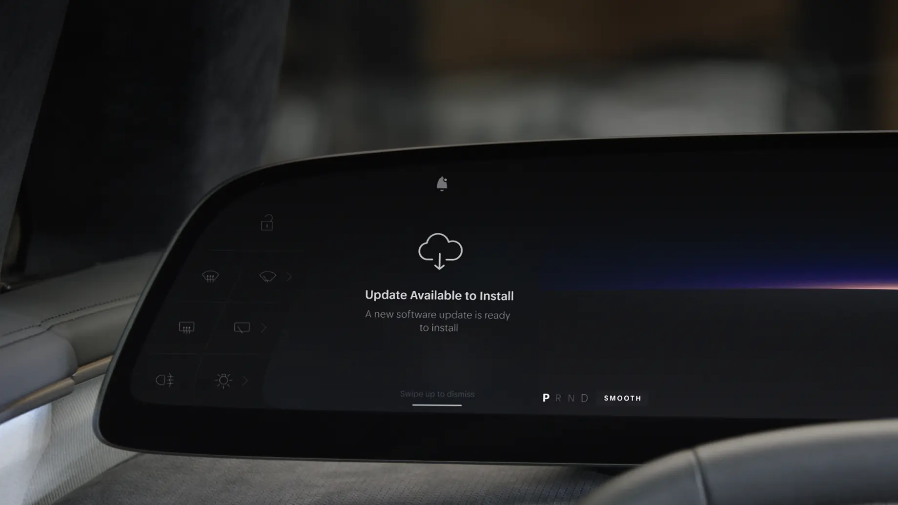 Car dashboard screen displaying "Update Available to Install" notification with a cloud download icon on a dark interface.