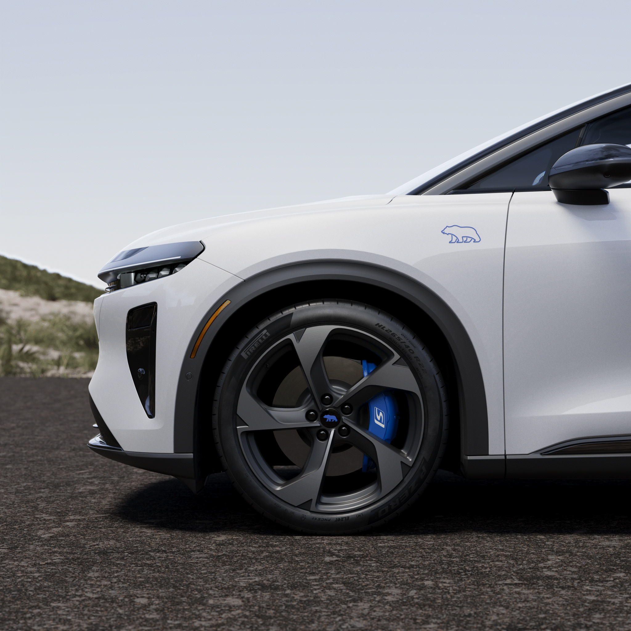Adaptive air suspension lowers at high speeds to enhance handling dynamics, stability, and ride refinement.