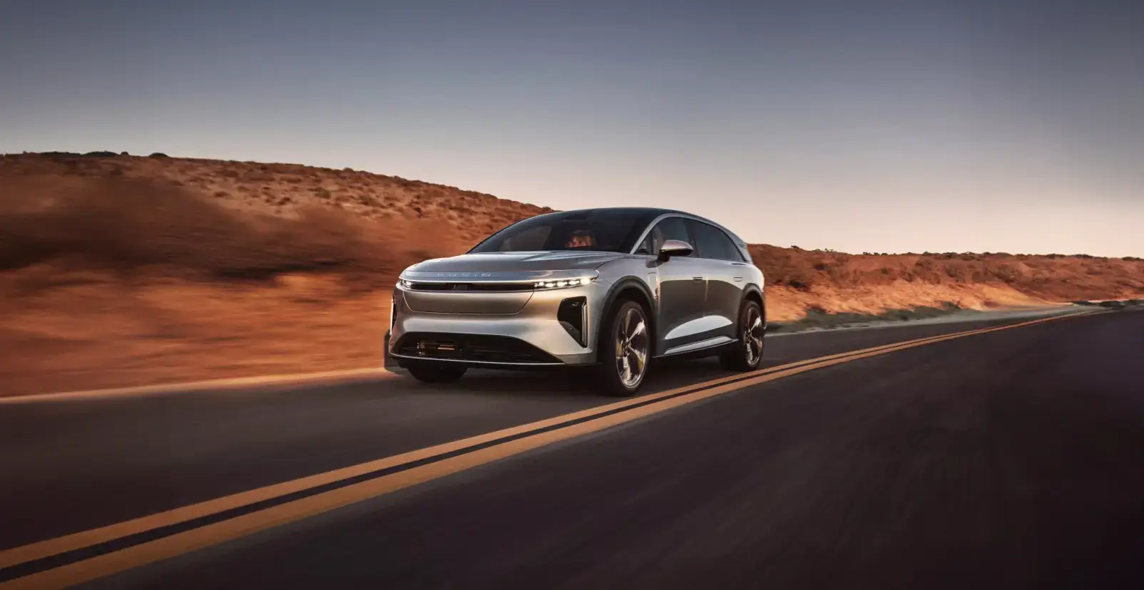 The Lucid Gravity driving down the road.