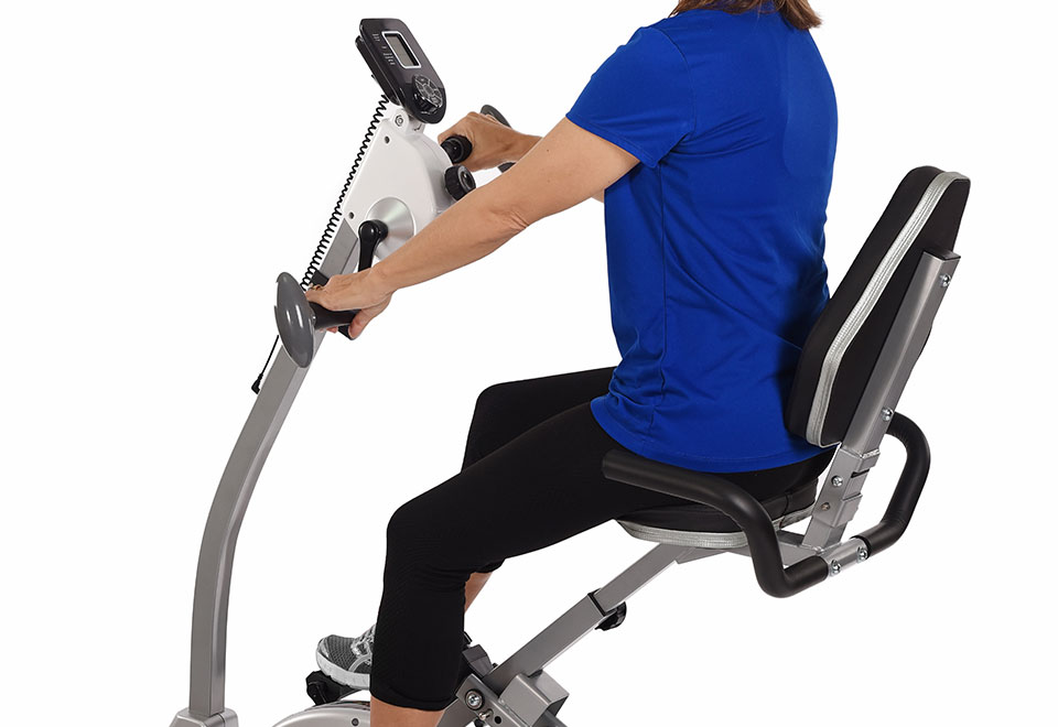 space saving recumbent exercise bike with upper body motion
