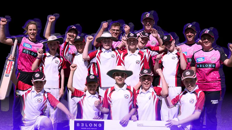 Group photo of a cricket team celebrating