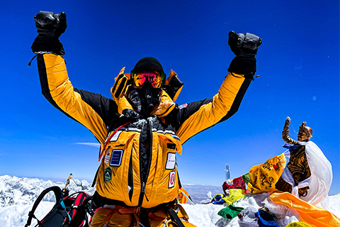 Andrew Hughes on top of Mt. Everest