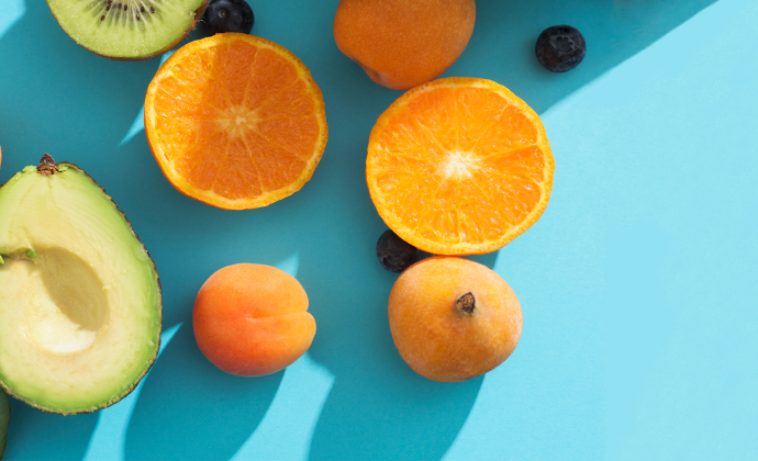 Sliced citrus fruit on a kitchen table.