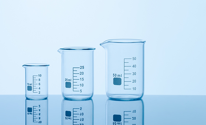 Three differently-sized beakers on a table