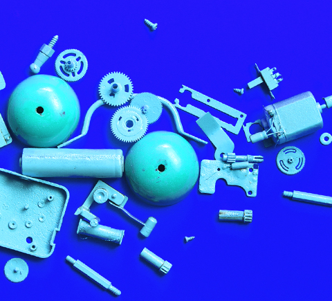 deconstructed parts on a blue canvas