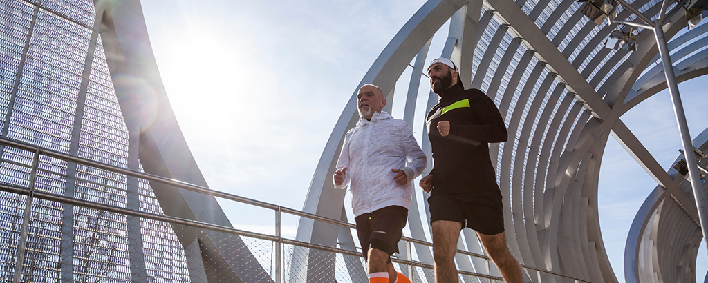 An image of two friends jogging.