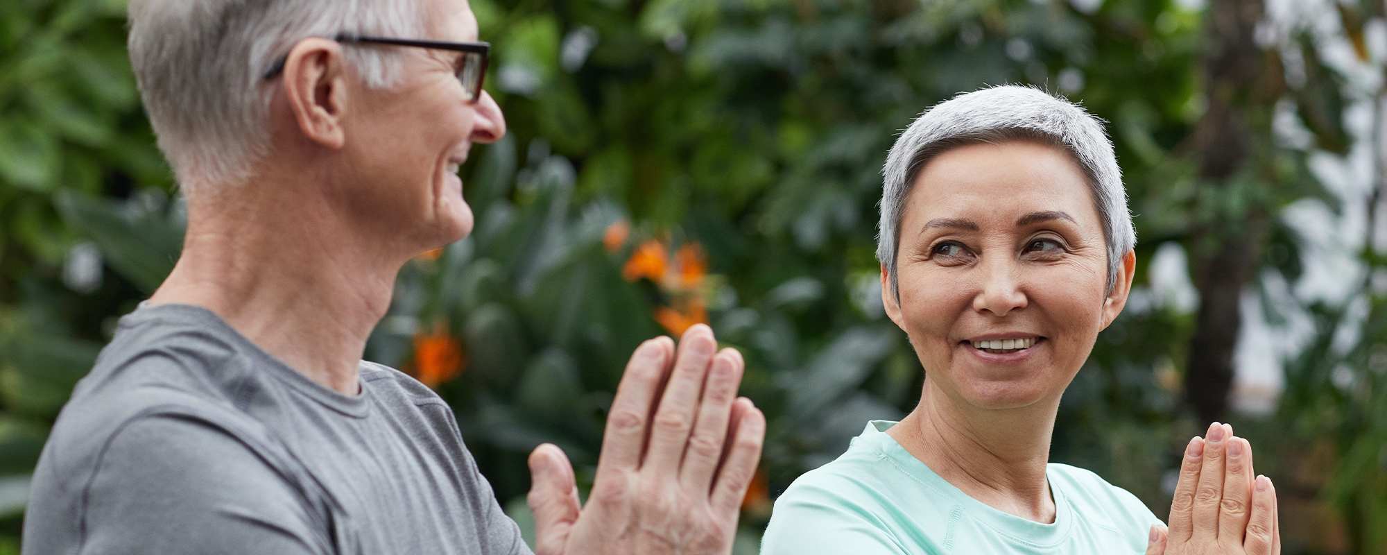 senior couple doing yoga