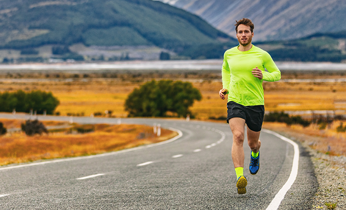 Guy running on the road