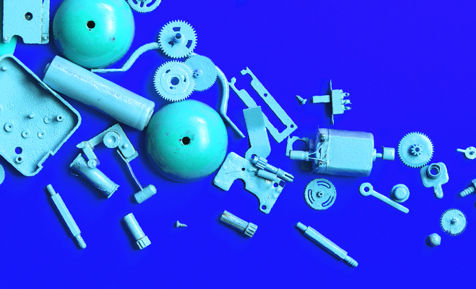 deconstructed parts on a blue canvas