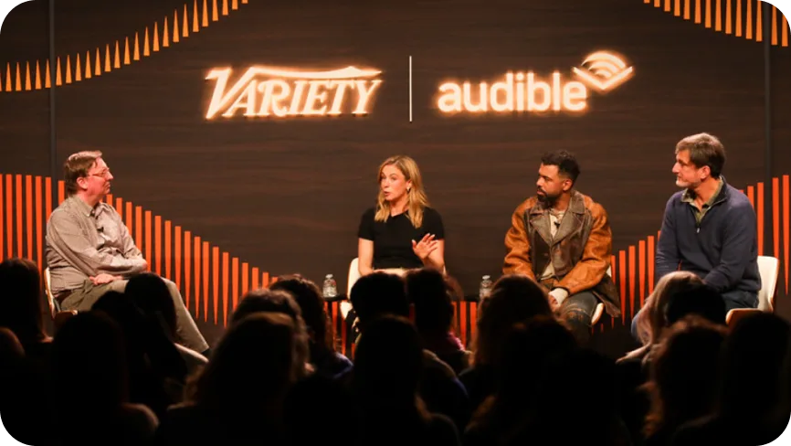 People on stage at an event hosted by Variety and Audible