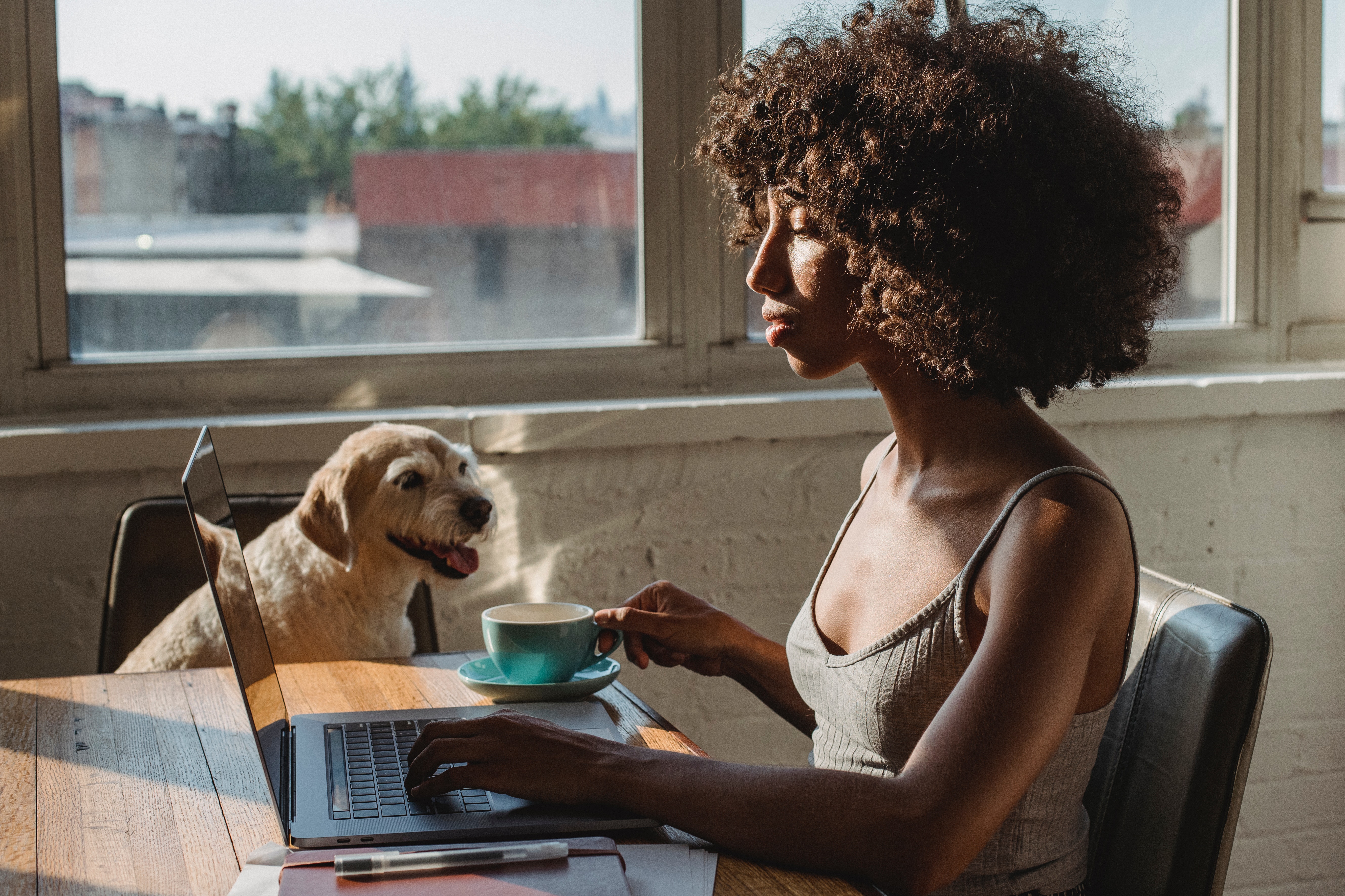 Woman with dog and afro