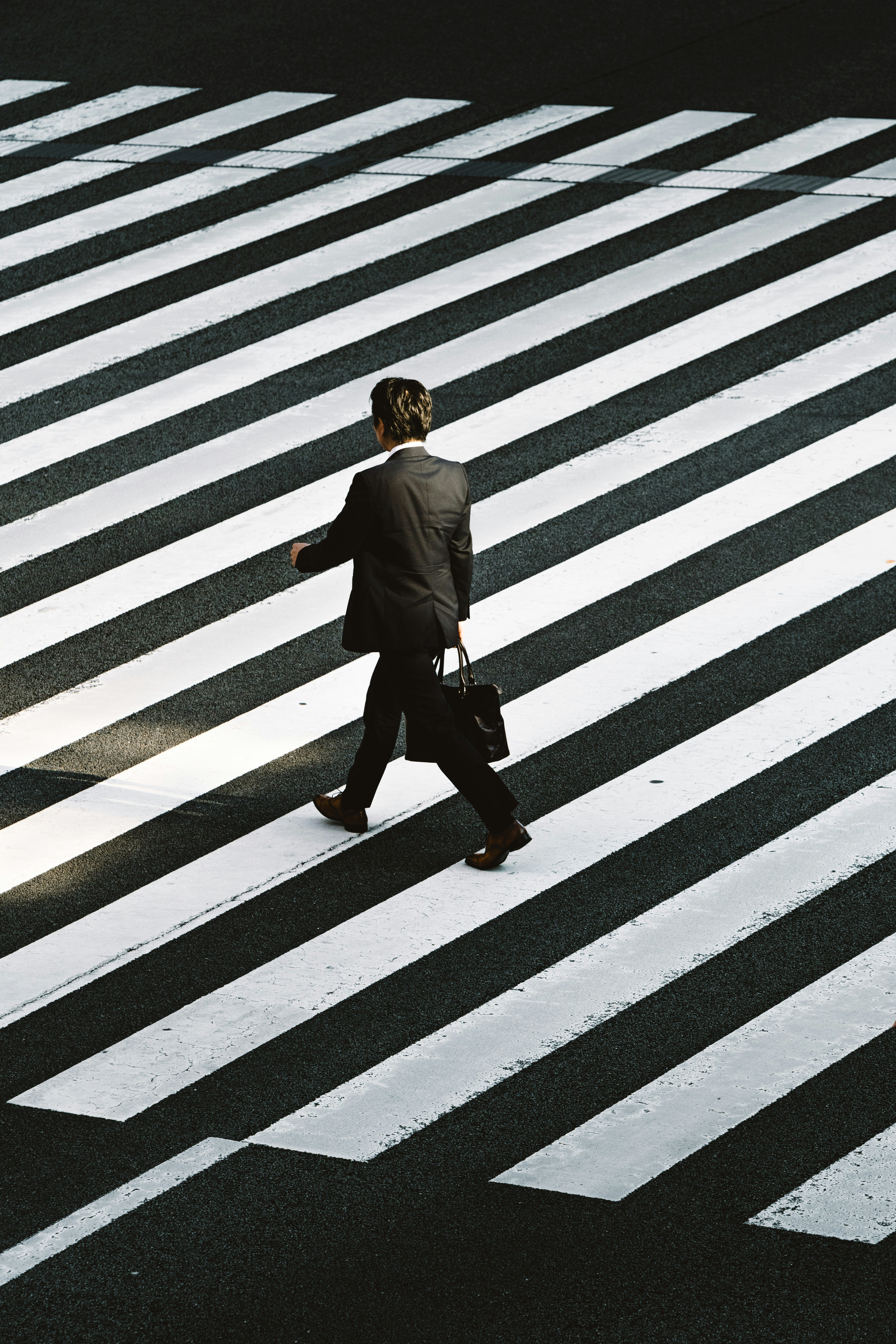 businessman%20crossing%20the%20street.jpg