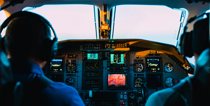 A Tour of Popular Open Source Frameworks for LLM-Powered Agents – airplane cockpit (banner)